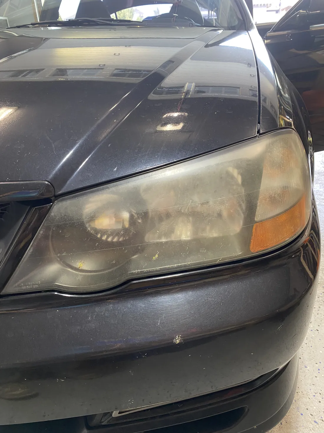 Oxidized, hazy headlight before restoration